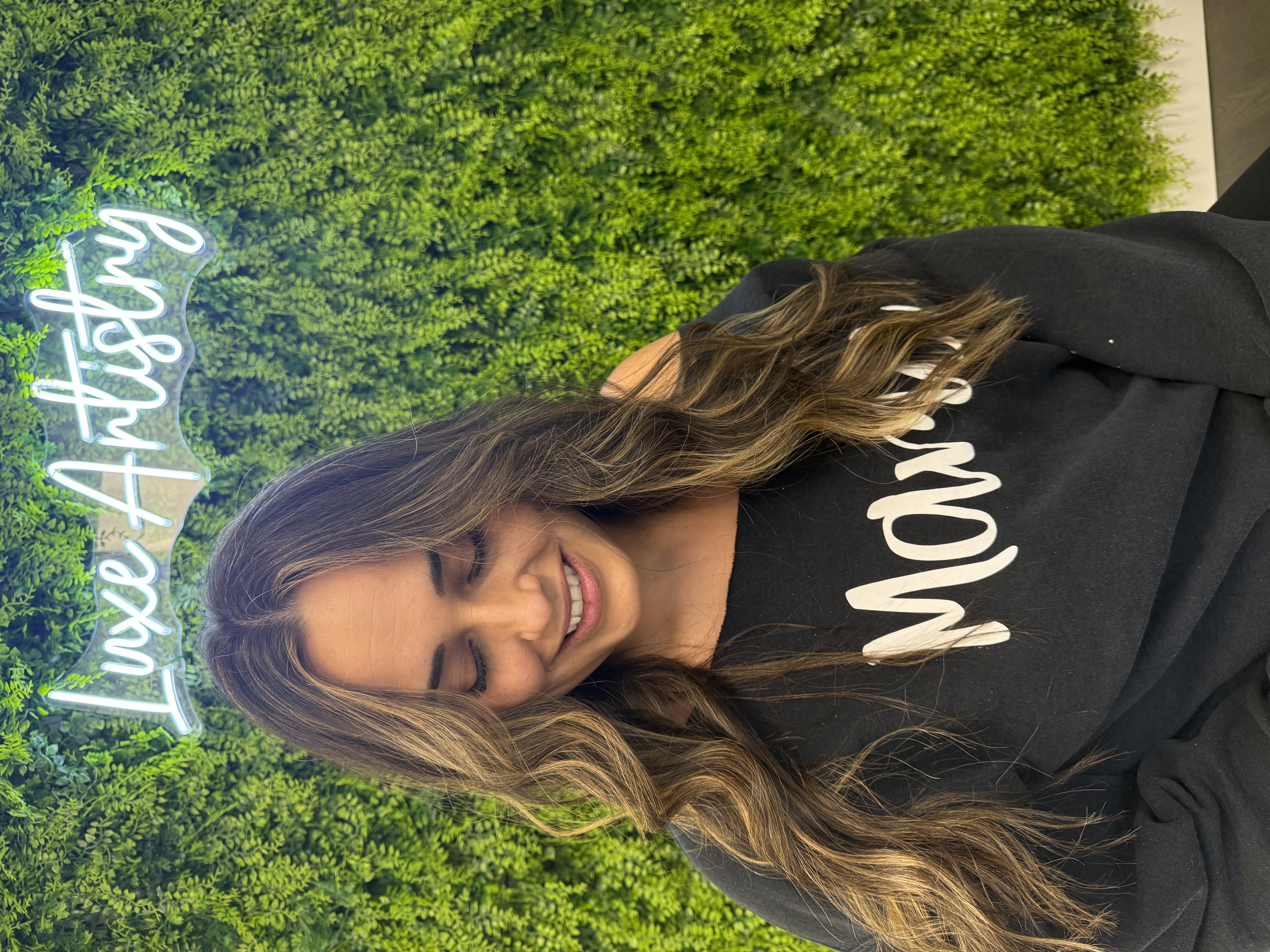 Long brunette balayage waves by Luxe Artistry Greenport NY